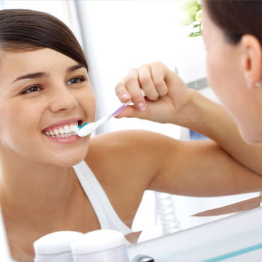 dr parekh and associates services oral hygiene background image